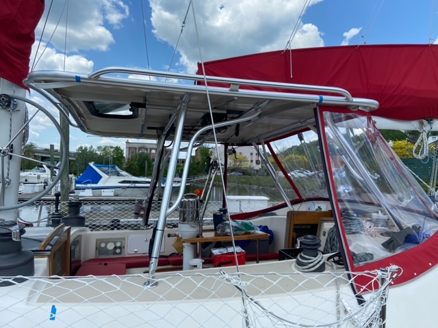 Ta Shing Orion 50 Hard Dodger installation with a red enclosure