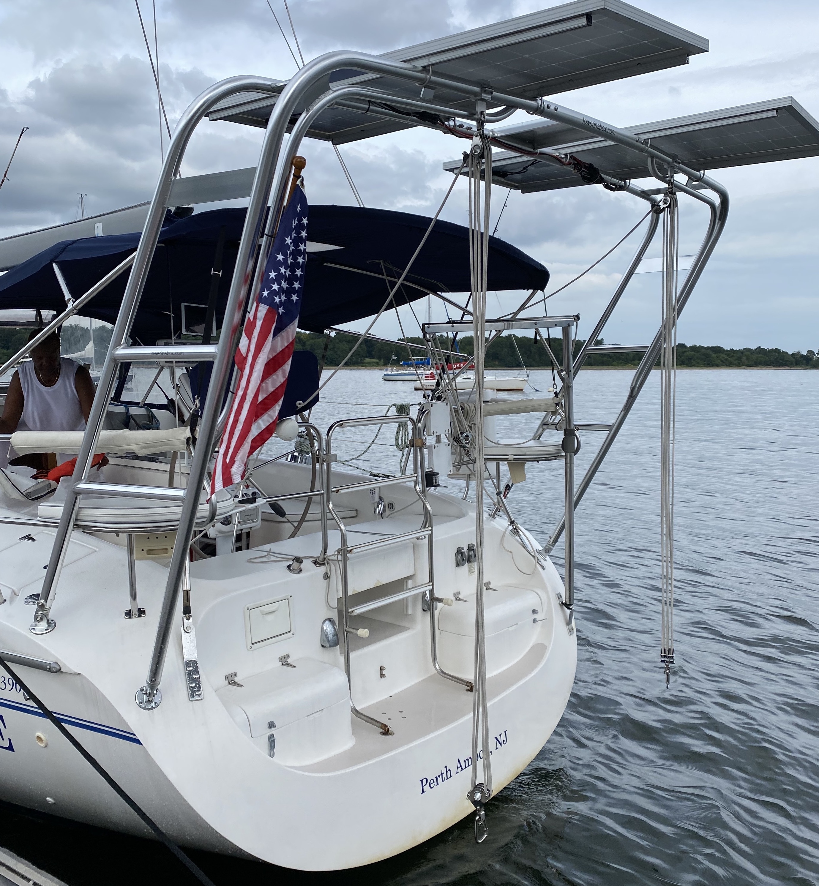 Catalina 390 Sail Arch with solar-panel support and dinghy davits