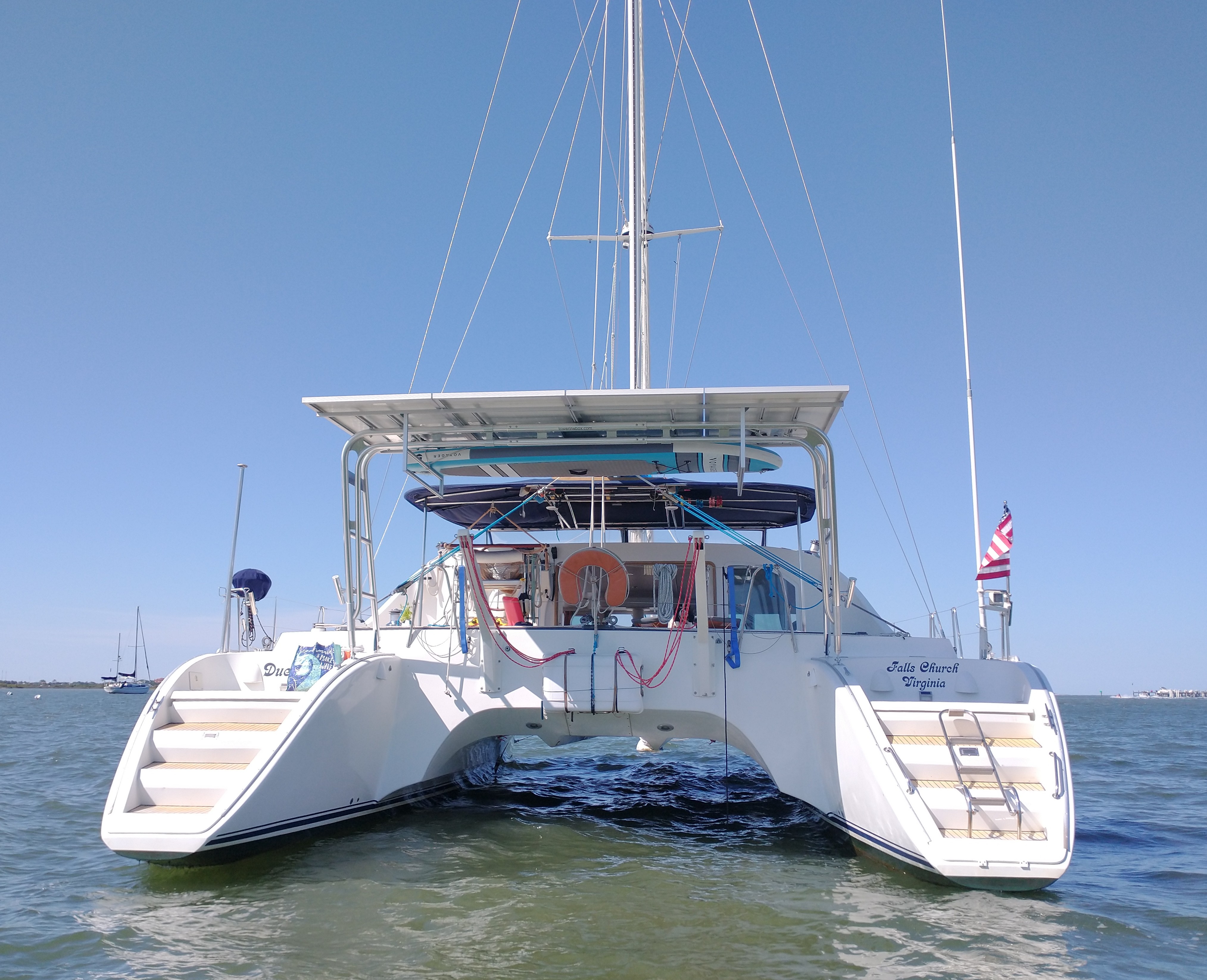 Lagoon 470 Super Sail Arch supporting a tender and outboard